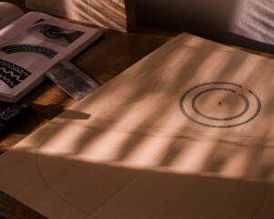 spruce soundboard with a circle rosette